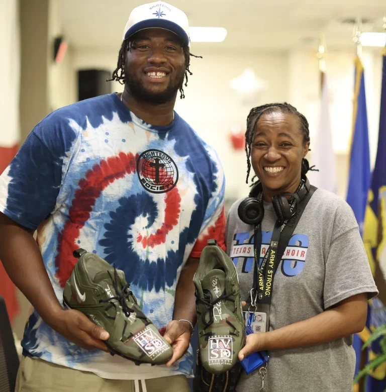 Deatrich Wise Jr. serving meals to veterans at Hot Meals for Vets